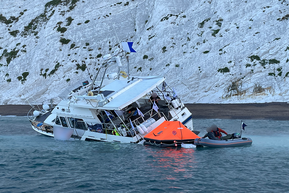 Grounding and subsequent loss of commercial swim event support vessel Channel Queen